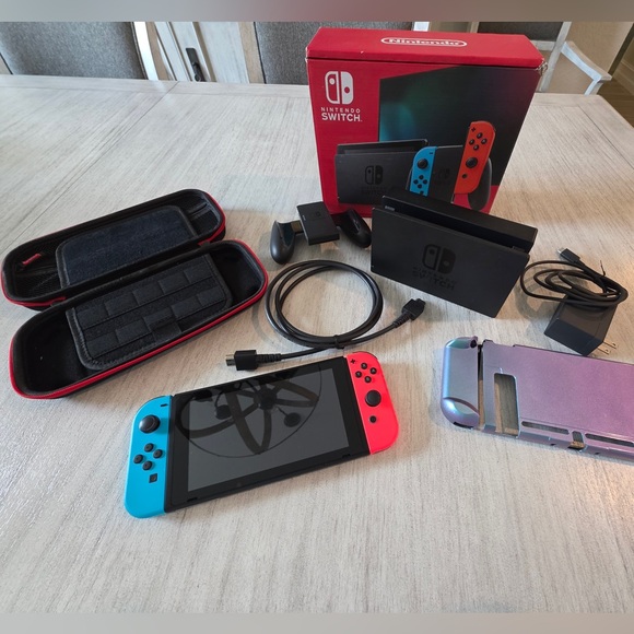 Nintendo Switch Other - Nintendo Switch with Neon Blue and Neon Red Joy-Con - Handheld Gaming Console